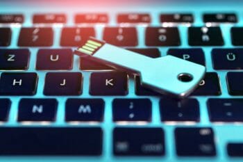 USB stick with important data is on the keyboard of the laptop